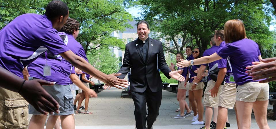 Rev. James J. Maher, C.M. and Niagara Students
