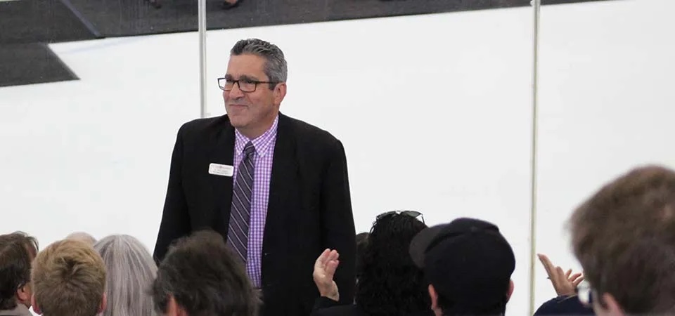 MS IF Dean Peter Butera in front of a crowd