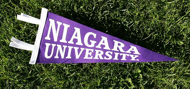 Niagara University pennant laying in the grass